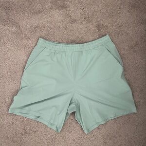 lululemon athletica Men's Mint Pace Breaker 7in’ inseam shorts